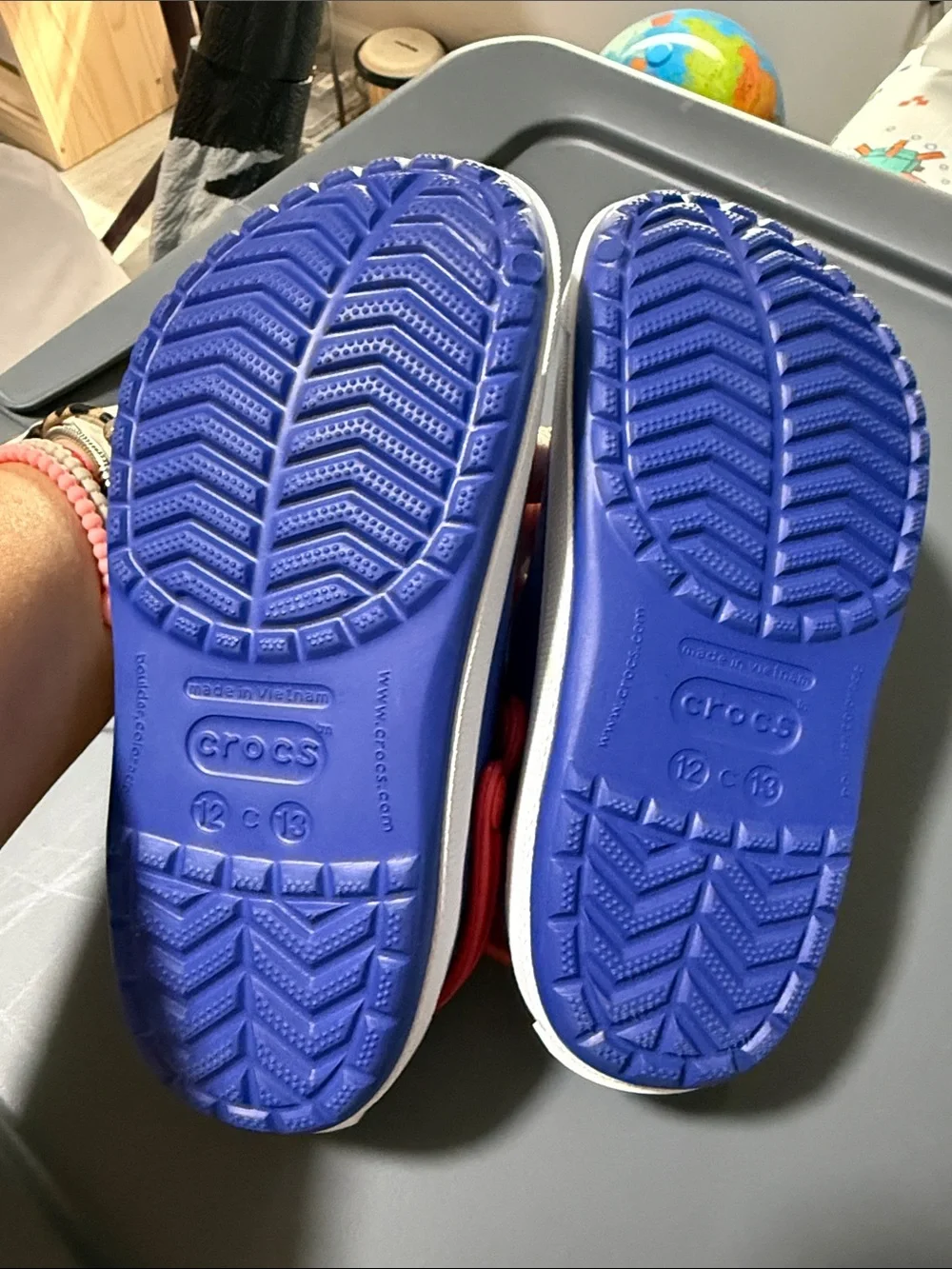 CROCS Kids Royal Blue Clogs with Red Heel Straps
